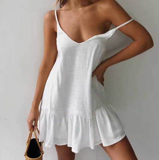 Sleeveless dress with ruffled hemline